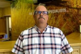 Kris Hand in checked shirt, glasses and a moustache, rejoins Roger Bullivant’s South Central residential team as operations manager, focusing on standardising practice, safety and skills development.