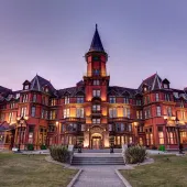 A picture of a castle at night
