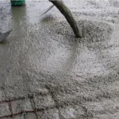 A concrete floor being poured