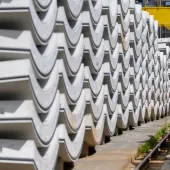 Precast concrete tunnel segments await transport to the construction site