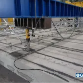 Hollowcore concrete beams under pressure in a laboratory