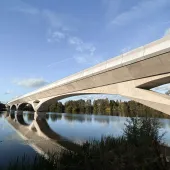 The Colne valley viaduct, a concrete bridge, stretches out over the Colne Valley