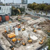 An aerial view of Bauer Spezialtiefbau's 8-metre-deep excavation pit, which is now ready for the construction of the 18-storey, 69.5-metre-tall administrative building for Landschaftsverband Rheinland (LVR), which is due to complete in 2028.
