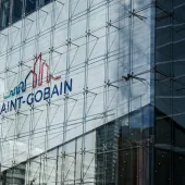 A close up of the Saint Gobain headquarters facade with logo.