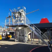 Ammann's new compact Elba CFS (Concrete Filling Station) against a blue sky