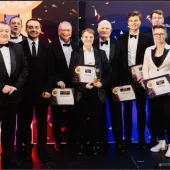 A large group of smiling people in dinner dress, Winners of the FPS Awards 2024
