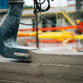 The Instatiq P1 printer head applying solid concrete walls directly on site, cutting build time and emissions.