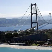 A rendering of the 3,300 m suspension bridge that will connect Sicily to mainland Italy with road and rail, supported by 40 km of new infrastructure by the Stretto di Messina (Messina Strait company).