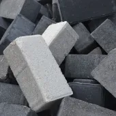 a pile of differently coloured concrete blocks.