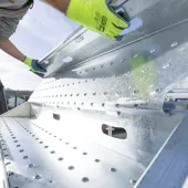 A close up of someone assembling PER UP's new "public stairs", which enable safe, high-footfall access across construction and infrastructure sites.