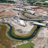 Aerial view of the re-aligned River Cole near Coleshill, showing the new meandering channel created to enable construction of HS2 viaducts at Delta Junction.