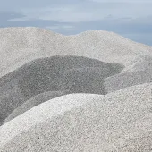 A close up photo of a pile of aggregates with light and shade
