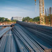 Rebar and a yellow tower crane