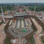 An aerial view of The 14,500-tonne concrete box structure for HS2’s A46 Kenilworth bypass bridge was built offline and slid into place in just 18 days. (Image courtesy HS2 Ltd)