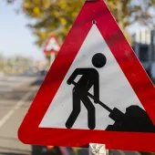 A men at work sign