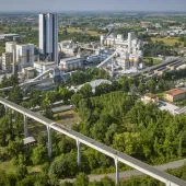 An aerial view of Heidelberg Materials' cement plant in Rezzato-Mazzano, Italy, surrounded by countryside