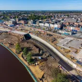 An aerial photo of the the Stockton Waterfront Urban Park. with the town in the background