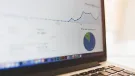 Analytics graphs on a MacBook screen by Luis Llerena / Creative Commons