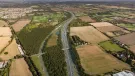 An aerial view of the Lower Thames Crossing junction with the M25 (looking north), with a new bridge for Ockendon Road. Image: National Highways.
