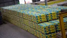A pile of cement bags in a warehouse