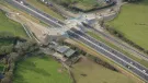 An aerial view of the Marazanvose green bridge spanning the new dual carriageway and old A30.