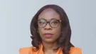 A head and shoulders picture of Ola Obadara FCIOB will serve as CIOB Vice President for 2025/26, the first black woman to hold the role, wearing an orange top and glasses with shoulder length hair