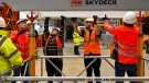 A group of PPE glad people receive formwork training from PERI UK, which delivers hands-on, accredited formwork training at its Brentwood facility and nationwide.