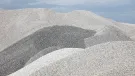 A close up photo of a pile of aggregates with light and shade