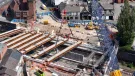 A blue crawler crane lifts Beam 9 into position at Greek Street last month (August, 2025).