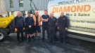The Diamond Hire and Sales team celebrating 20 years of supplying specialist construction equipment.