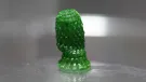 3D-printed "pineapple" with cyanobacteria growing inside after a development period of 60 days.